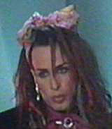 Close up of Alexis as member of band