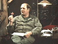 Charles hold a maple leaf